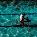เด็กเรียน ว่ายน้ำ: สุขภาพและพัฒนาการของเด็ก Photo child learning swimming